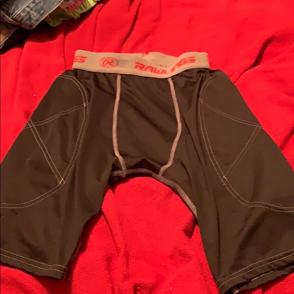 Men’s medium slider shirts with pads on side.